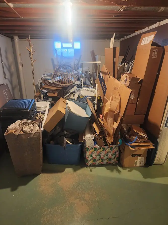 Roll-off dumpster container at job site for 15 Yard Dumpster Rental in Caldwell